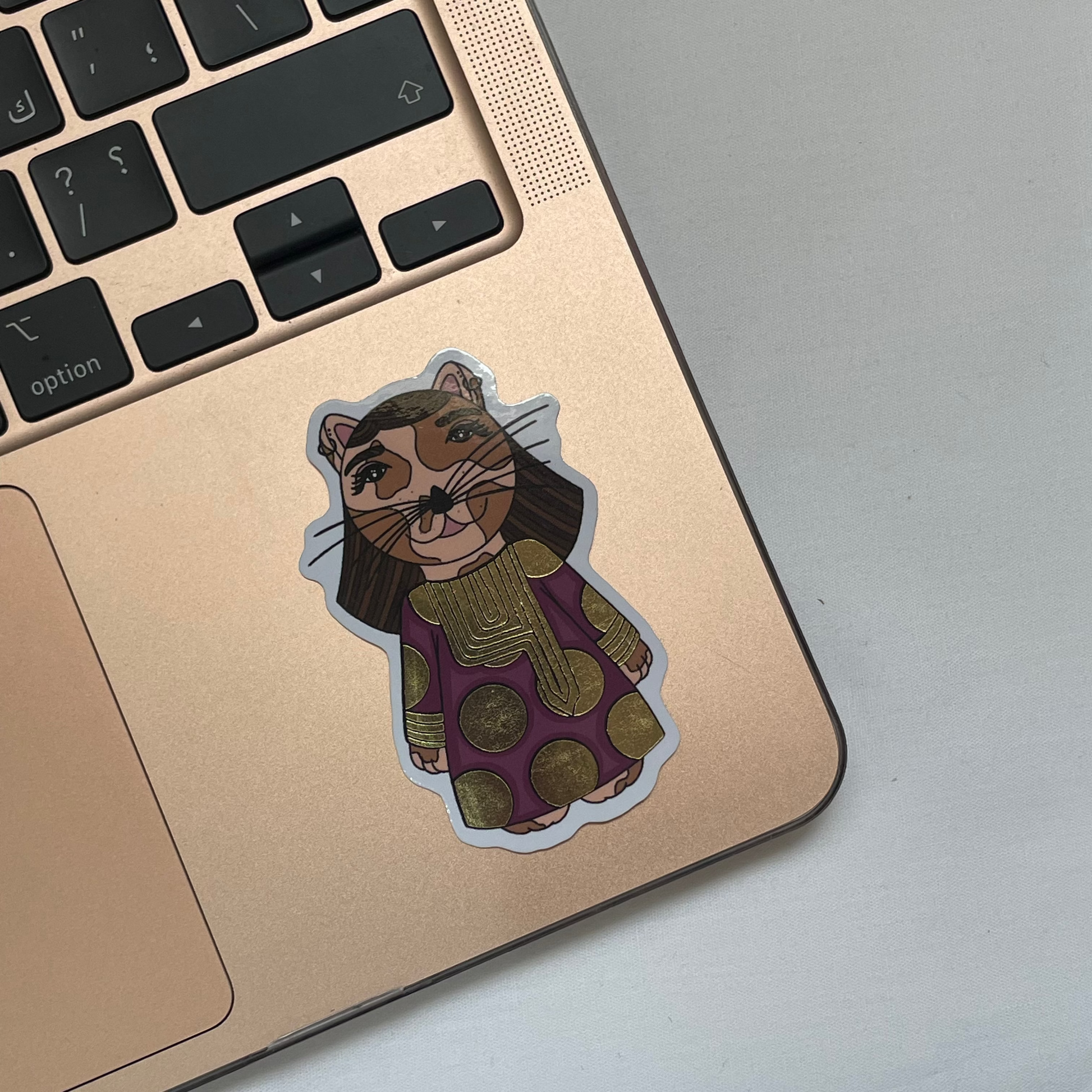 Waterproof sticker design featuring intricate gold foil accents, creating a luxurious and elegant look. The sticker combines durability with style, making it ideal for personalizing items like laptops and water bottles. The gold details shine against a durable, scratch-resistant, and waterproof surface, ensuring the sticker maintains its beauty over time.