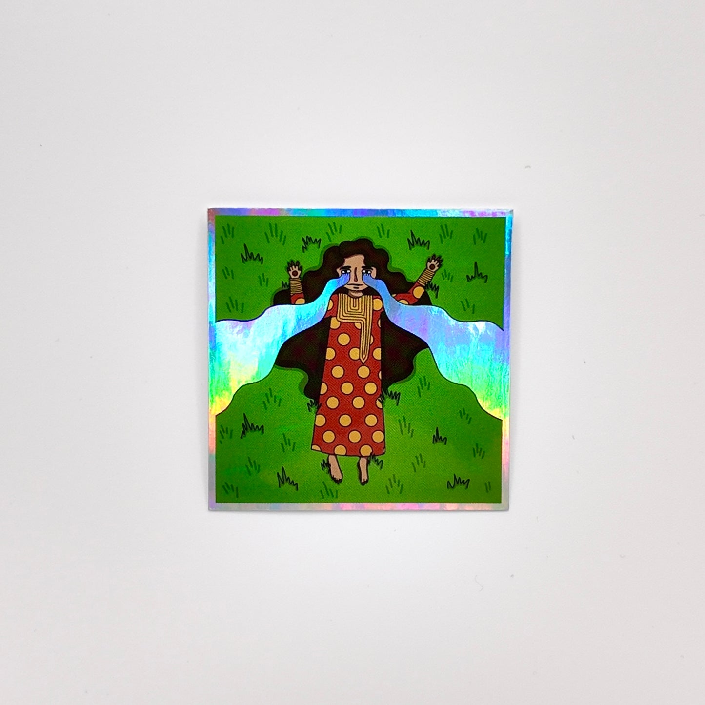 Waterproof sticker with mesmerizing holographic details that reflect light beautifully from every angle. The vibrant, reflective shimmer gives it a unique, futuristic look, perfect for decorating items like laptops, phone cases, water bottles, and notebooks. Its durable, water-resistant finish ensures long-lasting use while adding a stylish touch to personal accessories.