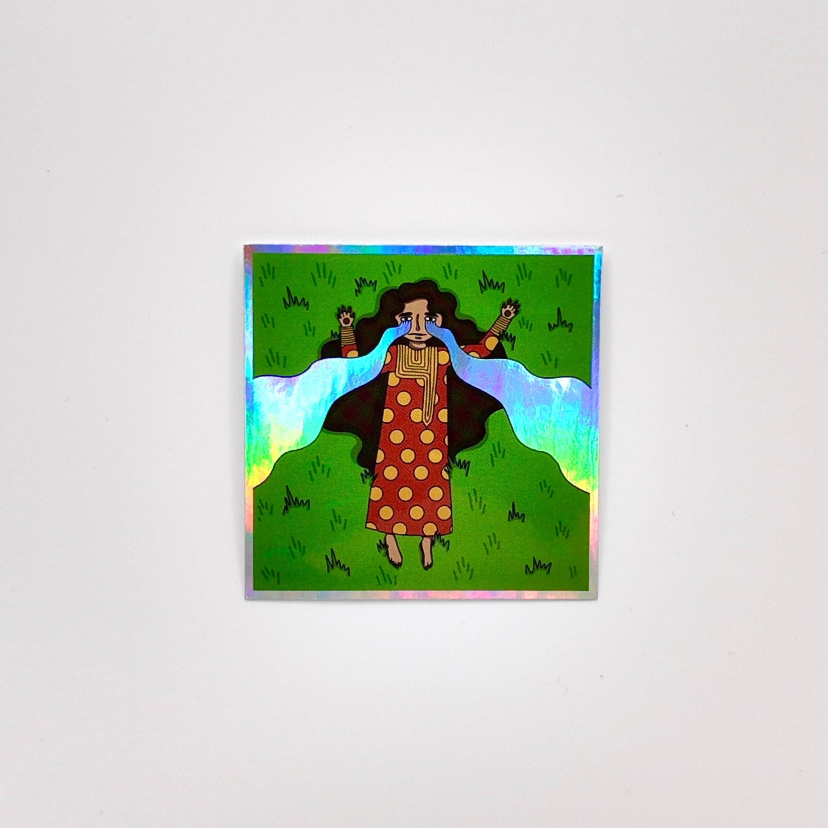 Waterproof sticker with mesmerizing holographic details that reflect light beautifully from every angle. The vibrant, reflective shimmer gives it a unique, futuristic look, perfect for decorating items like laptops, phone cases, water bottles, and notebooks. Its durable, water-resistant finish ensures long-lasting use while adding a stylish touch to personal accessories.
