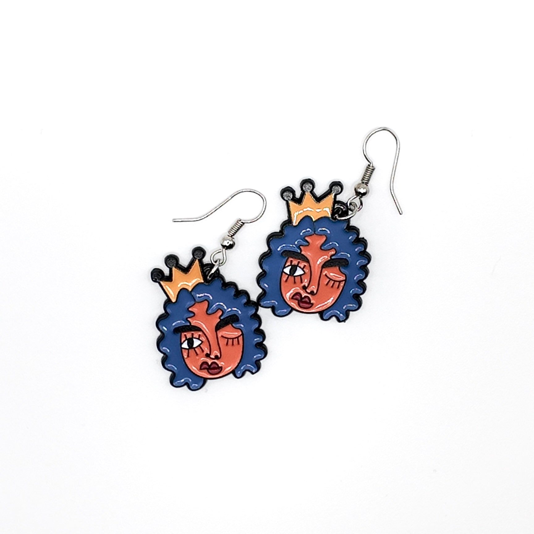 Cubism-inspired earrings crafted from original artwork, featuring a bold and artistic design. These unique, eye-catching earrings transform creative expression into wearable art, perfect for making a statement. Ideal for those who want to stand out, they add a touch of individuality and creativity to any outfit, whether for a casual or dressed-up look.
